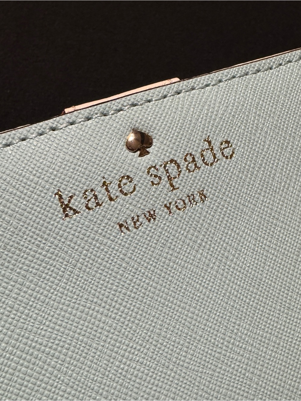 NWOT Kate Spade light blue wallet with gold logo